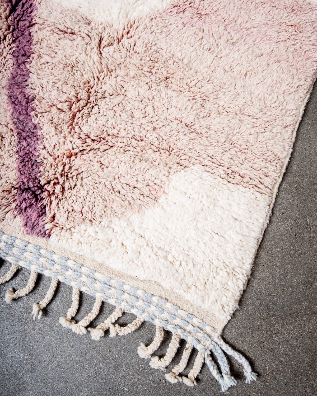 Modern, designer, handcrafted Berber rug from Morocco. Beniourain carpet with beautiful colours and patterns and fluffy wool texture.